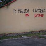 Murales con scritto "Difendi Livorno dai Livornesi"